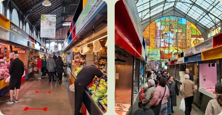 Sfeerbeeld van de Mercado de Atarazanas in Málaga met lokale marktkramen en het iconische glas-in-loodraam.