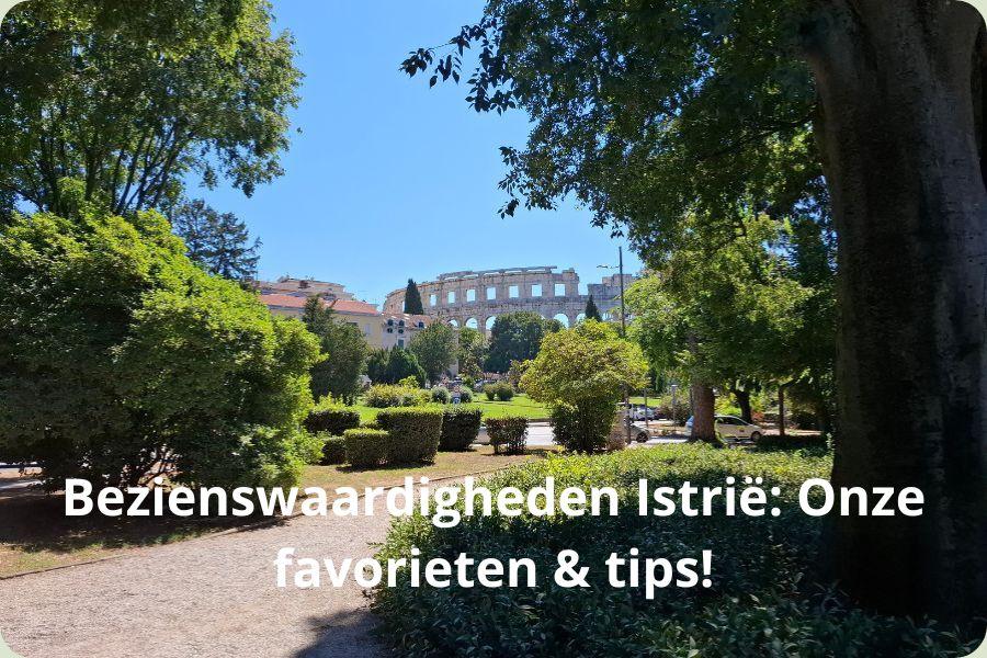 Het Romeinse amfitheater van Pula in Istrië gezien vanuit een groen park